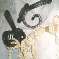 Coppia appendiabiti/fermatende ferro battuto