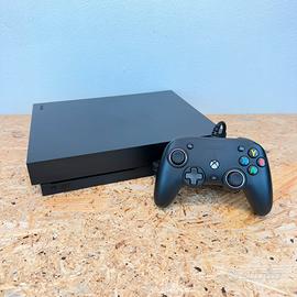 Xbox One X 1 TB nera completa con cavi controller