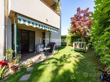 Tre locali doppi servizi con giardino, box e posto