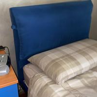 Letto singolo con testata imbottita