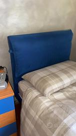 Letto singolo con testata imbottita