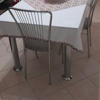 Tavolo in vetro + 4 sedie in acciaio 