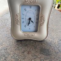 Orologio da tavolo ricoperto in argento