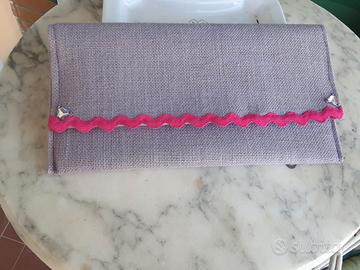 pochette lilla con bordo