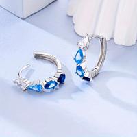 Orecchini Huggie in Argento 925 con Zirconi Colori