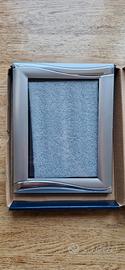 Cornice in alluminio placcato argento