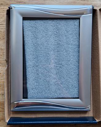 Cornice in alluminio placcato argento