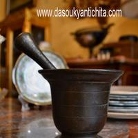 Antico mortaio con pestello in bronzo del 900
