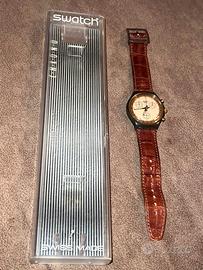 Orologio Swatch Goldfinger SCM100