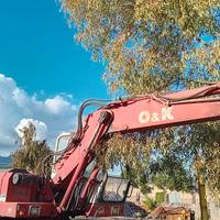 Escavatore gommato O&K