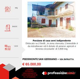 Porzione di bifamiliare con terreno 5800 mq