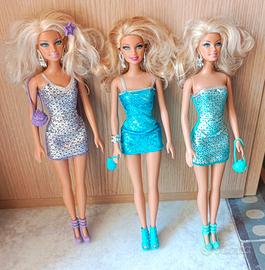 lotto 3 Barbie mattel e 4 outfit 