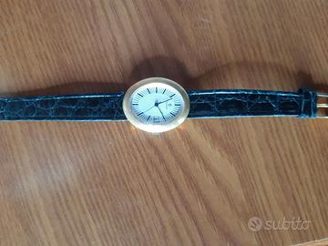 Orologio candino da polso in oro