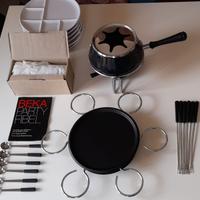 Servizio da fonduta nuovo + piatti
