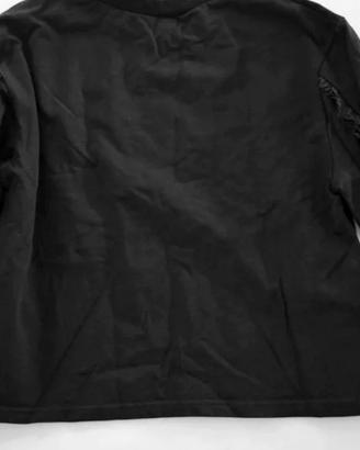 Maglia a maniche lunghe nero. 