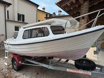 Barca pilotina + carrello rimorchio per trasporto