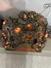 Presepe artigianale con luci e cascata