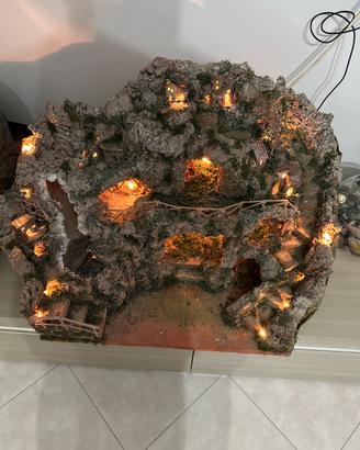 Presepe artigianale con luci e cascata