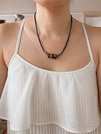 Collana con perline nere e pendente