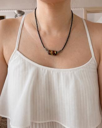 Collana con perline nere e pendente