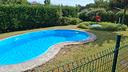 appartamento-con-giardino-e-piscina-a-bagnolo
