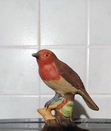 Statuetta vintage in ceramica rappresentante un pe