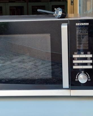 forno microonde compreso di tavolo 2 sedie e 2 ras