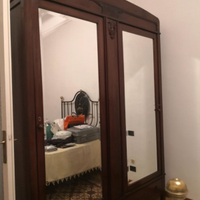 Camera completa con letto in ferro battuto