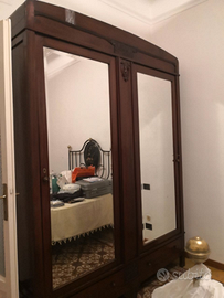 Camera completa con letto in ferro battuto