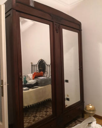 Camera completa con letto in ferro battuto