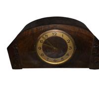 Antico orologio da camino a pendolo e rintocchi