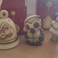 Statuine e piatto Thun