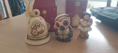 Statuine e piatto Thun