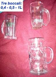 Tre boccali da birra in vetro