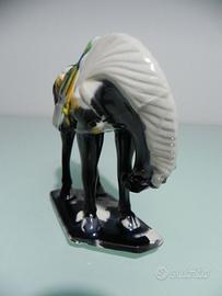 Coppia di cavallini in porcellana smaltata