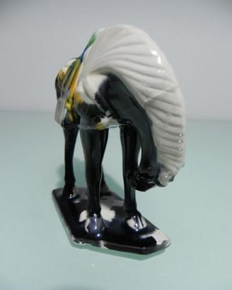 Coppia di cavallini in porcellana smaltata