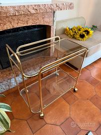Carrello in metallo dorato e vetro porta alcolici