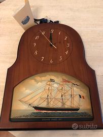 Orologio in legno decorato