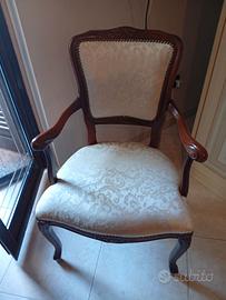 Letto in ferro battuto e poltrona classica