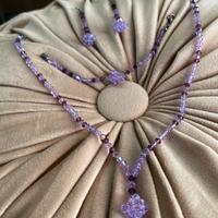 Parure collana, orecchini e bracciale lilla
