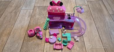 Stock Disney Minnie Topolino casa e moto sidecar 