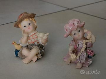 Statuine bambini con giochi