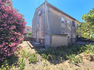 Appartamento piano terra con cortile Via Asproni