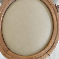 Sedia con braccioli a medaglione