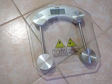 Bilancia pesa persona