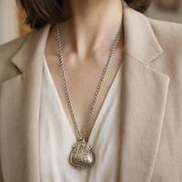 Collana lunga con portamonete vintage argentato