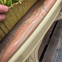 Tavolo con top in marmo rosa