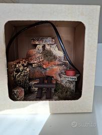 Presepe , focolare illuminato