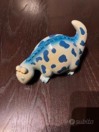 Salvadanaio a forma di dinosauro