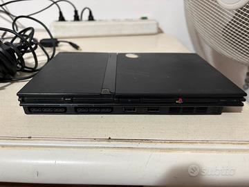 PlayStation 2slim senza joystick +14 giochi